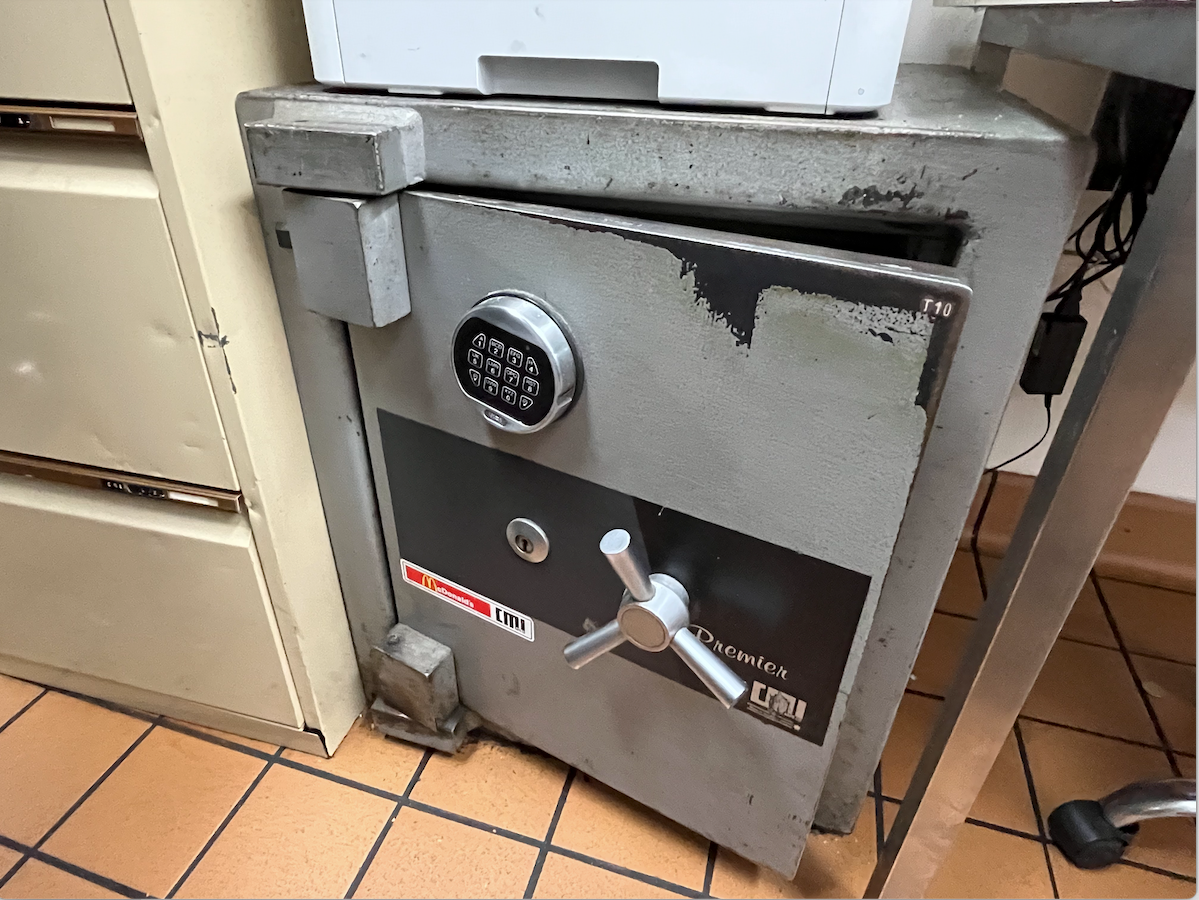 Half Open Safe On Tile Floor— The Skeleton Key Locksmiths & Security in West Tamworth, NSW