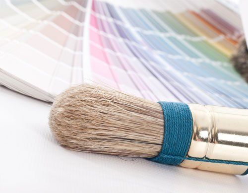 Paint brush and colour advise painter and decorator Lanarkshire