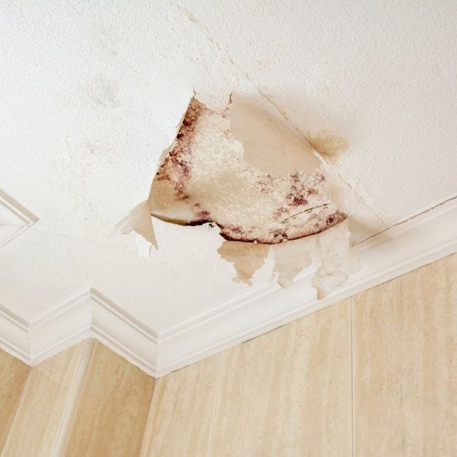 A ceiling with water coming out of it