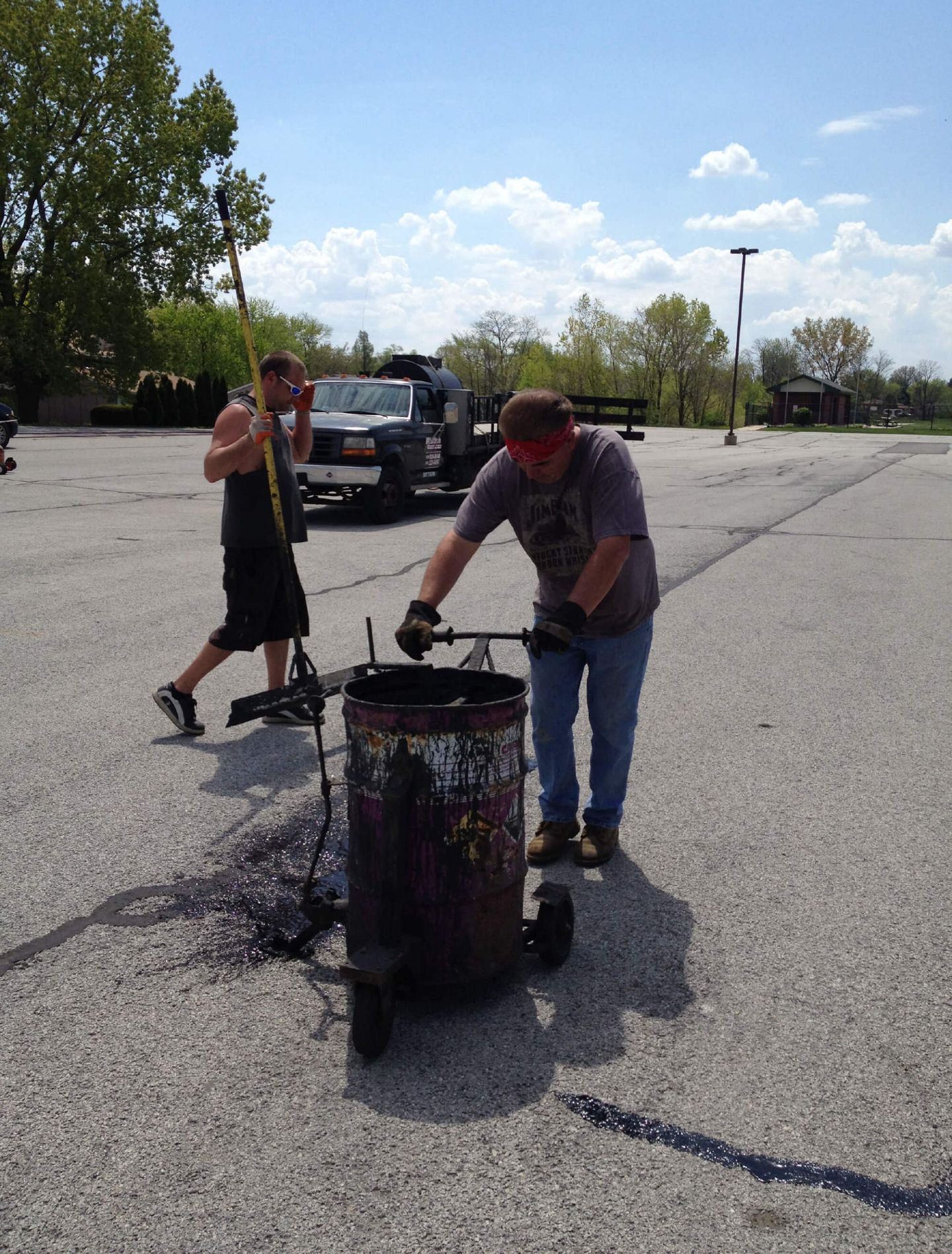 Two Workers Doing Asphalt Seal Coating — Schereville, IN — Ristich Asphalt Paving Inc