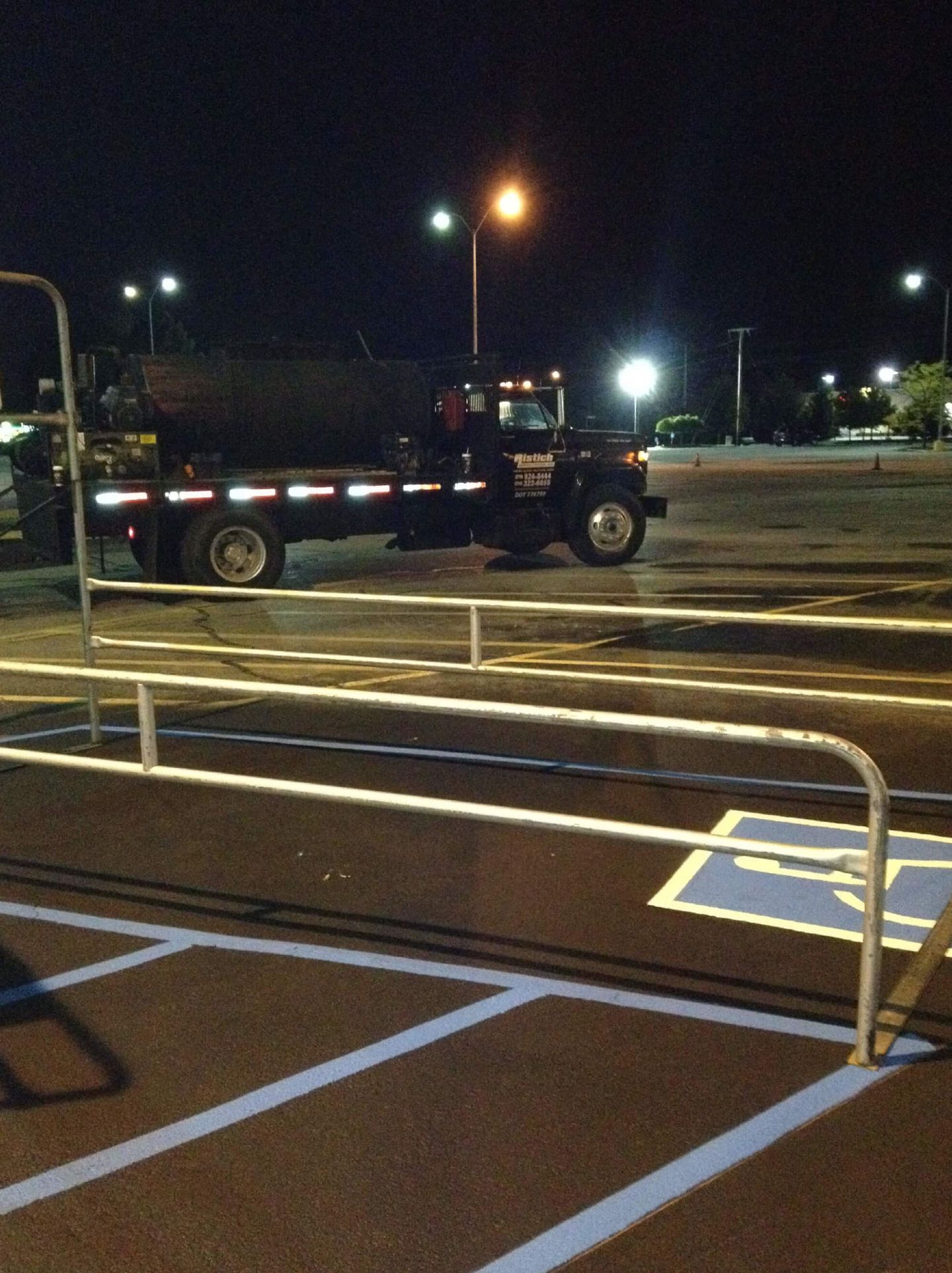 Black Truck In A Parking Lot — Schereville, IN — Ristich Asphalt Paving Inc