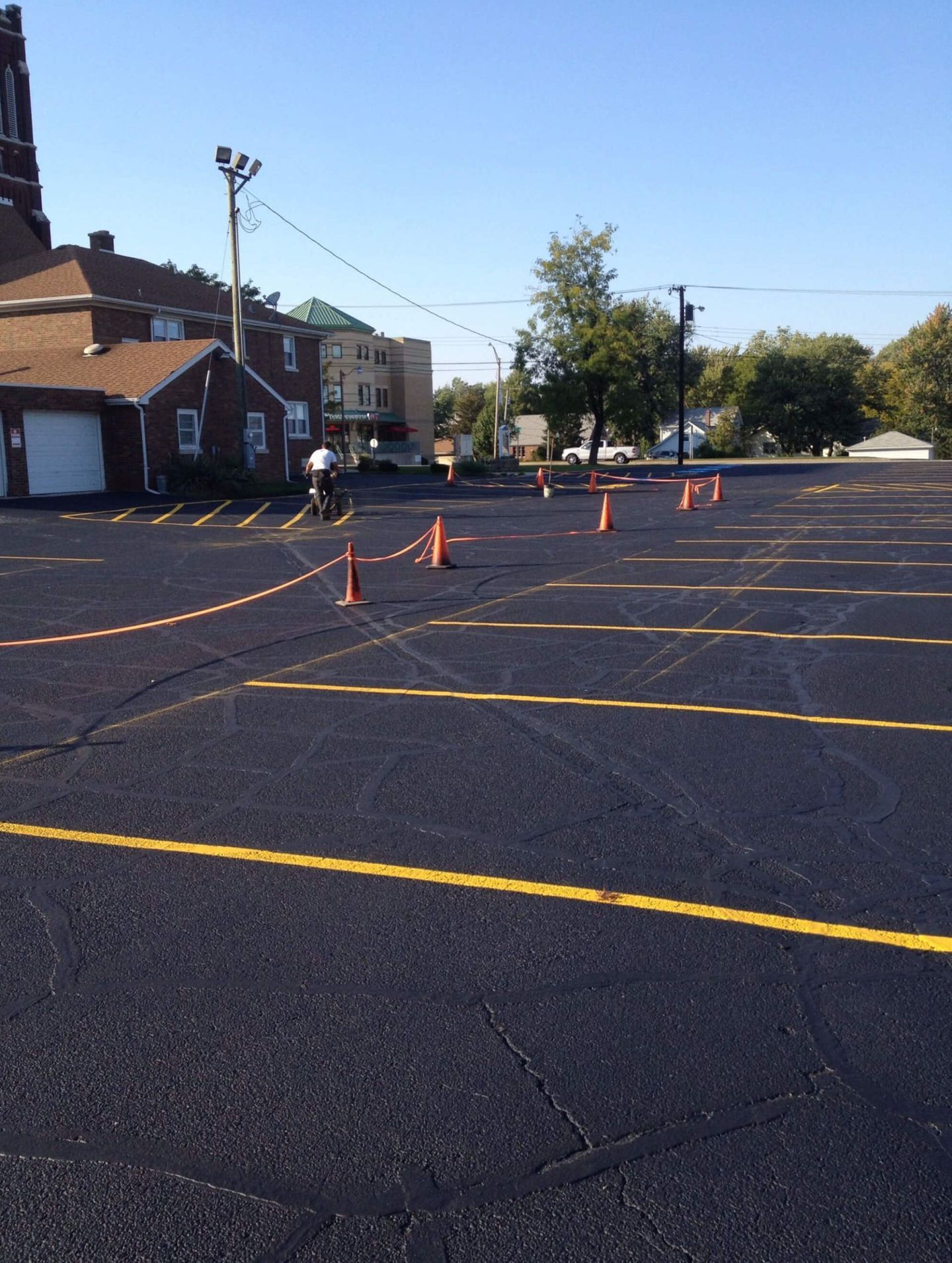 Worker Reparing The Parking Lot — Schereville, IN — Ristich Asphalt Paving Inc