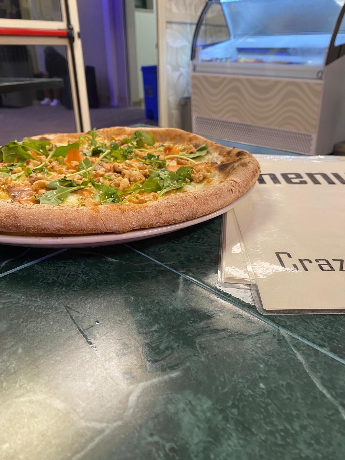 pizza cotta in forno a legna