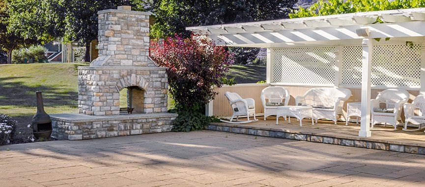 Outdoor Fireplace Covered Paver Patio