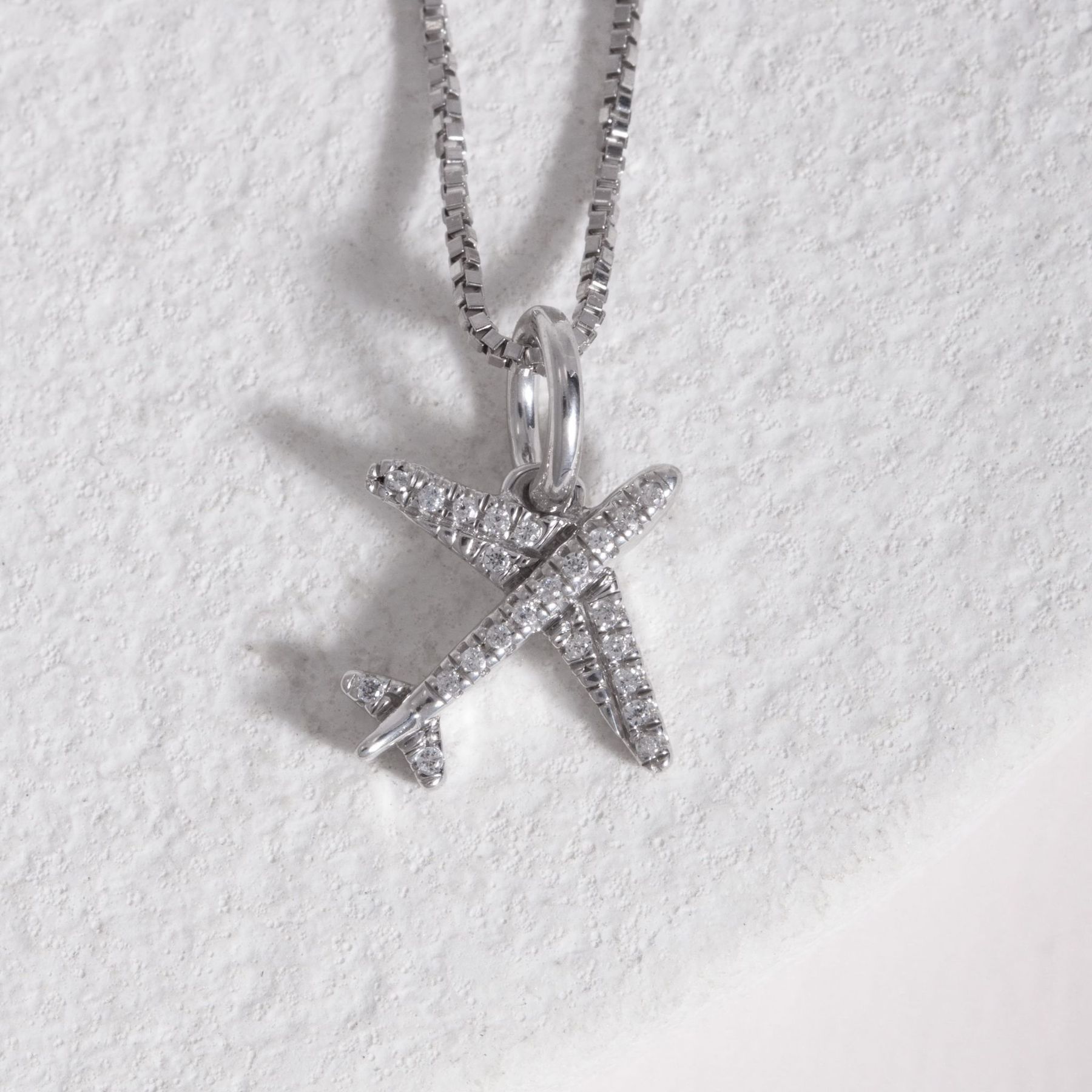 ella stein silver airplane necklace