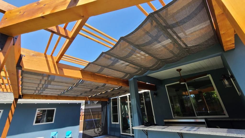 A house with a roof that has been damaged by a storm.