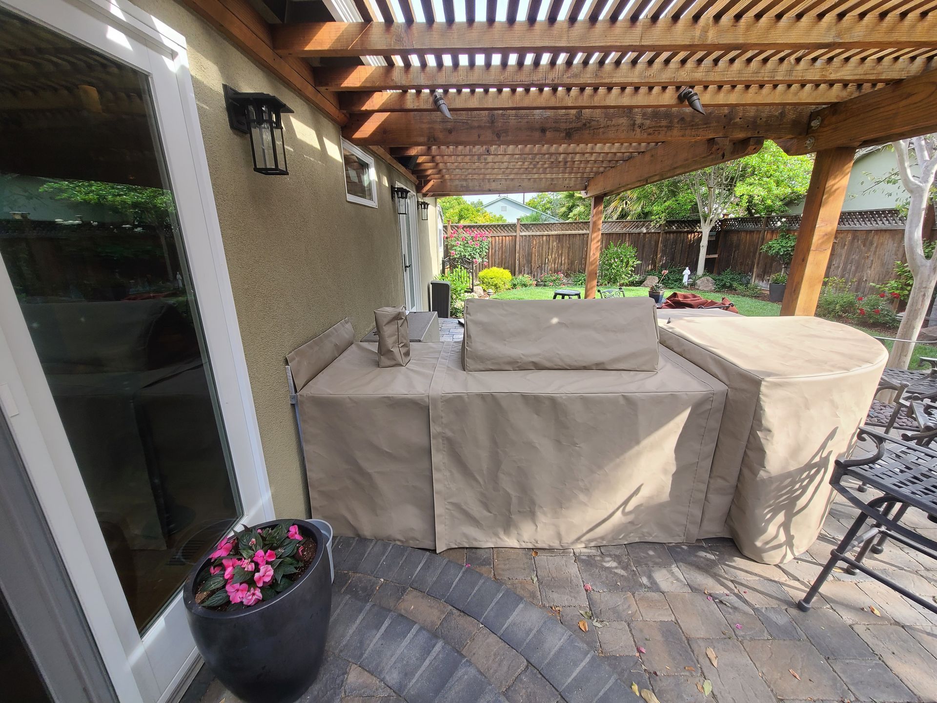 A green and white striped awning is on the front of a pharmacy