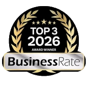 A black circular emblem with golden laurel leaves, five stars, and the text 