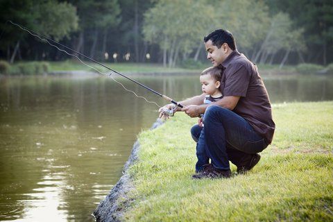 Dad fishing with son