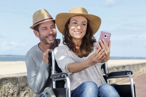 man with wife in wheelchair