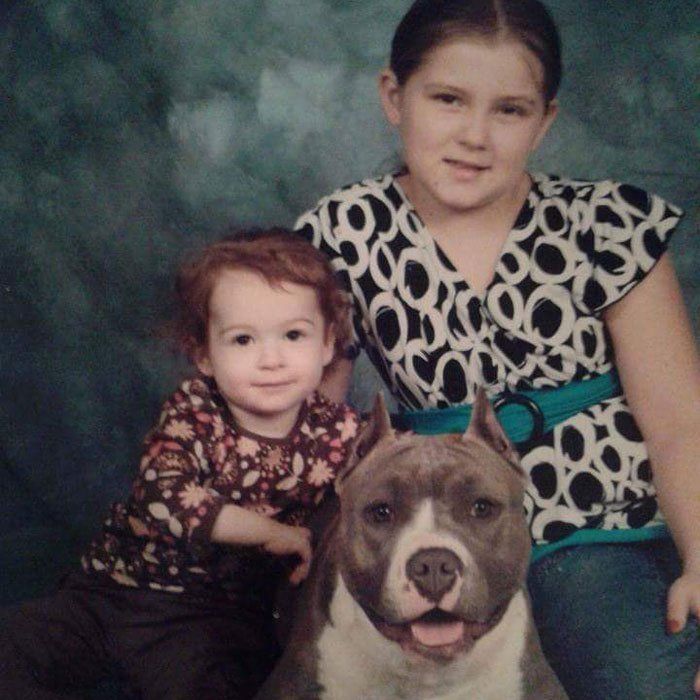 Lynnsee and Leeana with a prize winning pitbull.