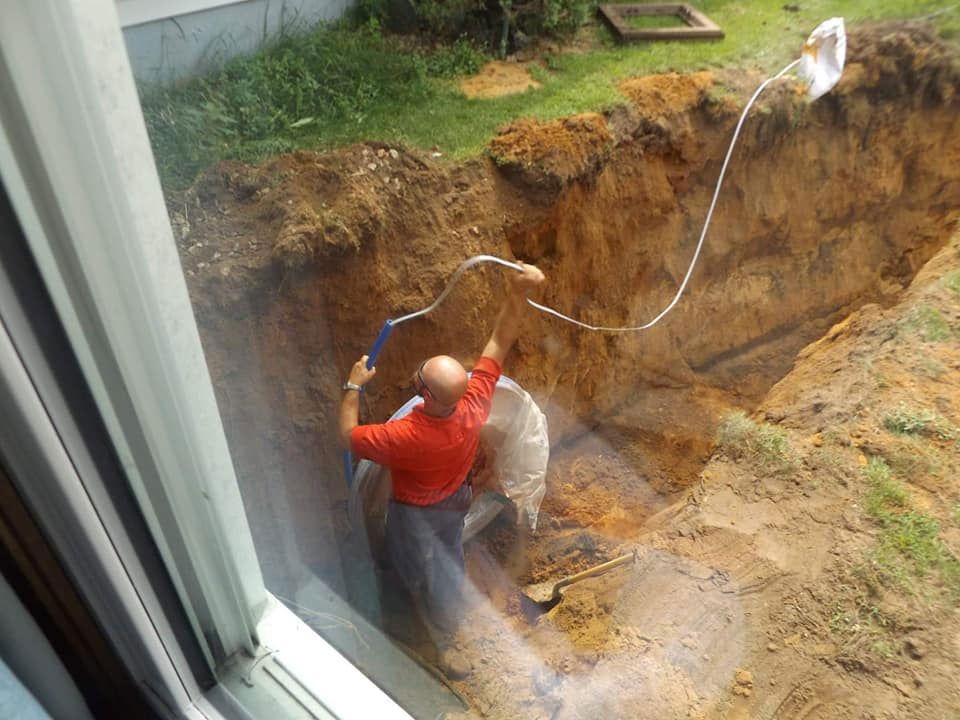 Working In A Trench — Sparta, WI — Mid-Wisconsin Pump & Well Service LLC