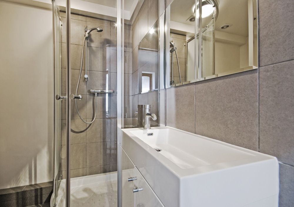 Shower room with faucet — Shower Screens in Tamworth, NSW