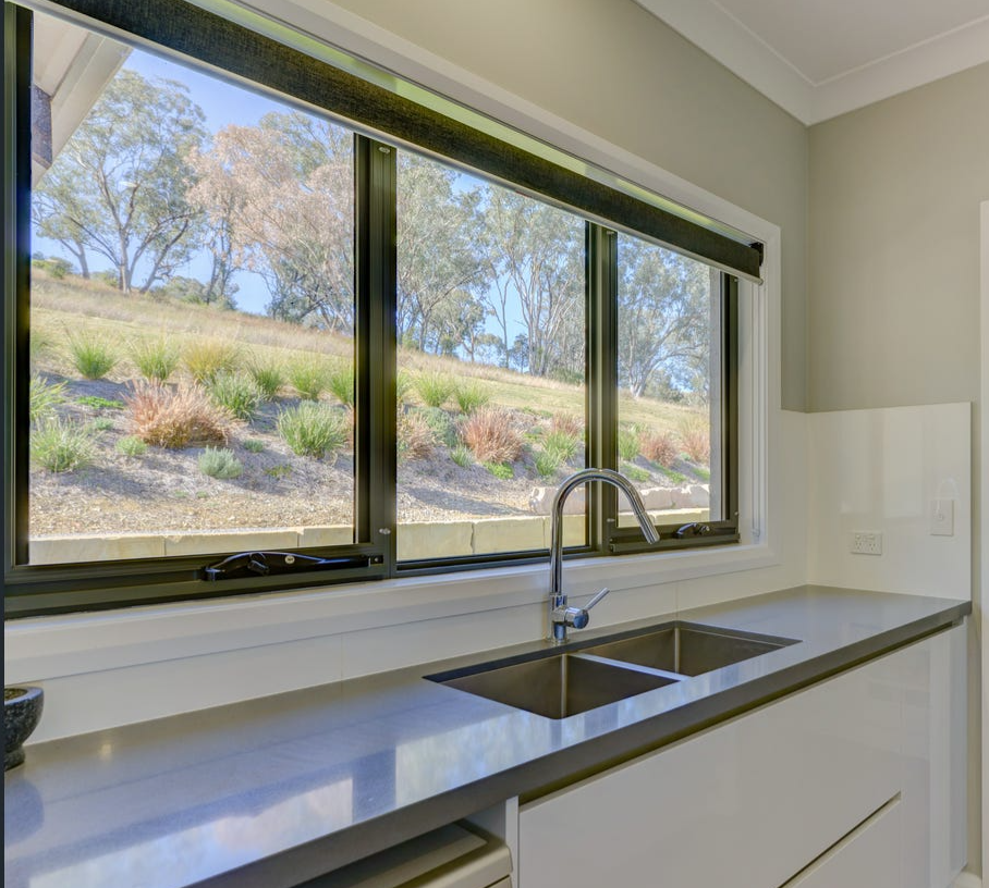 Black awning and steel structure over window frame — Windows & Doors in Tamworth, NSW