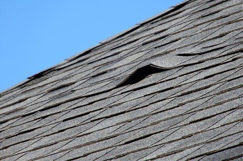 Buckling shingles roof — Indianapolis, IN — Rain-Flow Gutters
