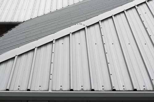 Fastened metal roof — Indianapolis, IN — Rain-Flow Gutters