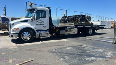 Eagle Towing Truck with White Car on the Back — Lockouts in Sacramento, CA