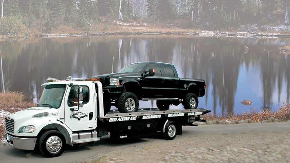 Eagle Tow Truck Parked Beside a Lake — Lockouts in Sacramento, CA