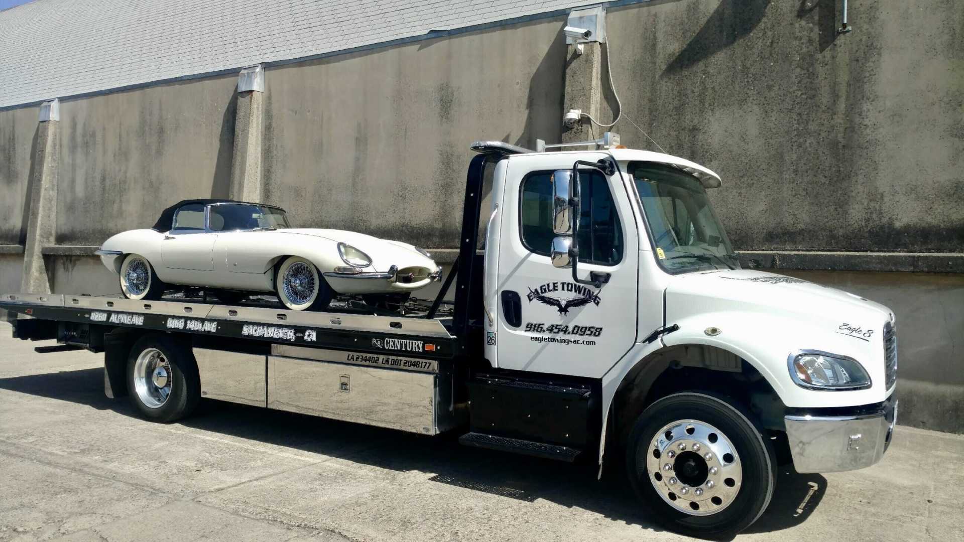 Truck With White Car — Lockouts in Sacramento, CA