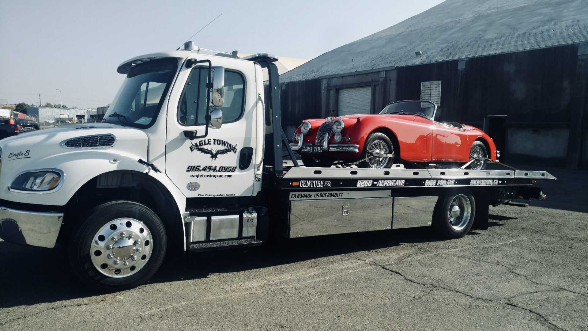 Truck With Red Car — Lockouts in Sacramento, CA