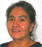 A close up of a woman 's face with a white background.