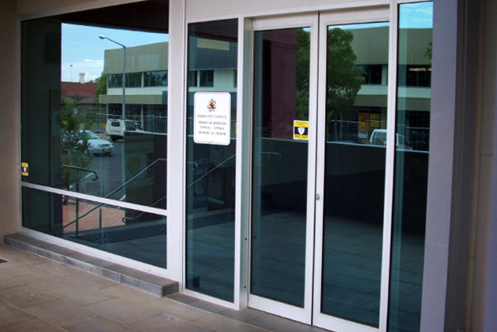 Security Glass Commercial Doors — Windows & Glass Services in Dubbo, NSW