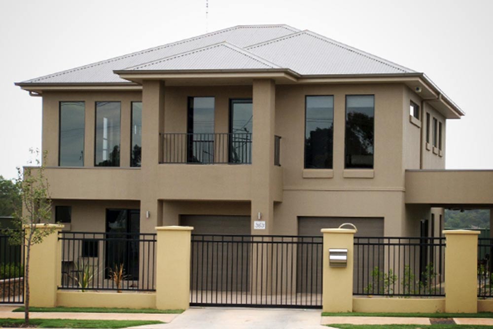 House With Tall Glass Windows And Balustrades — Windows & Glass Services in Dubbo, NSW