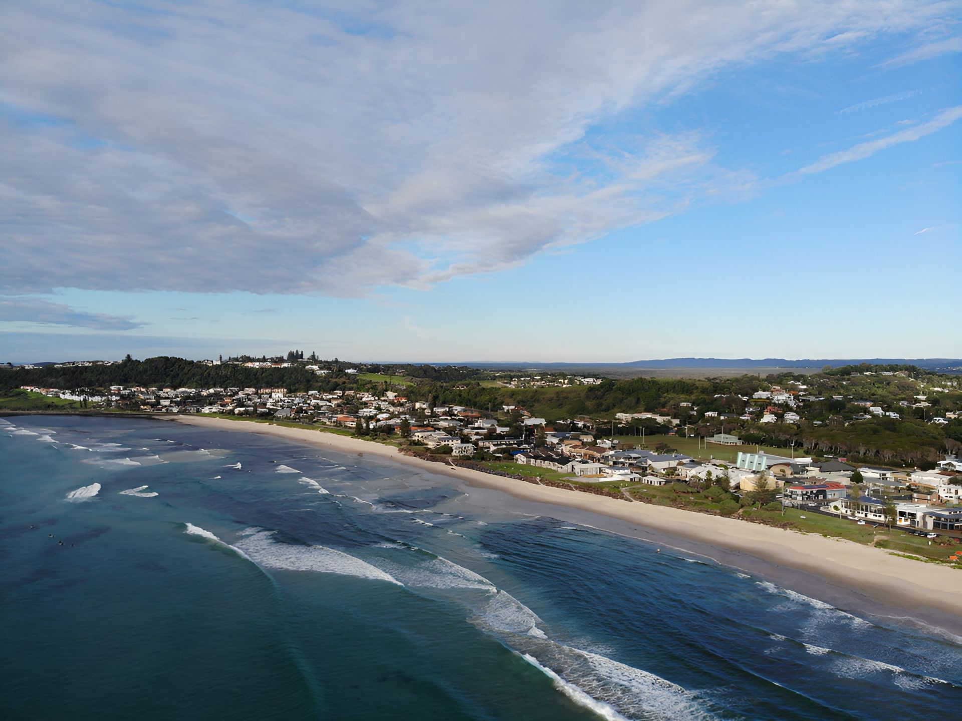 Coastal Aerial View With a Sandy Beach and Blue Waves — Intolec Electrical In Ballina, NSW