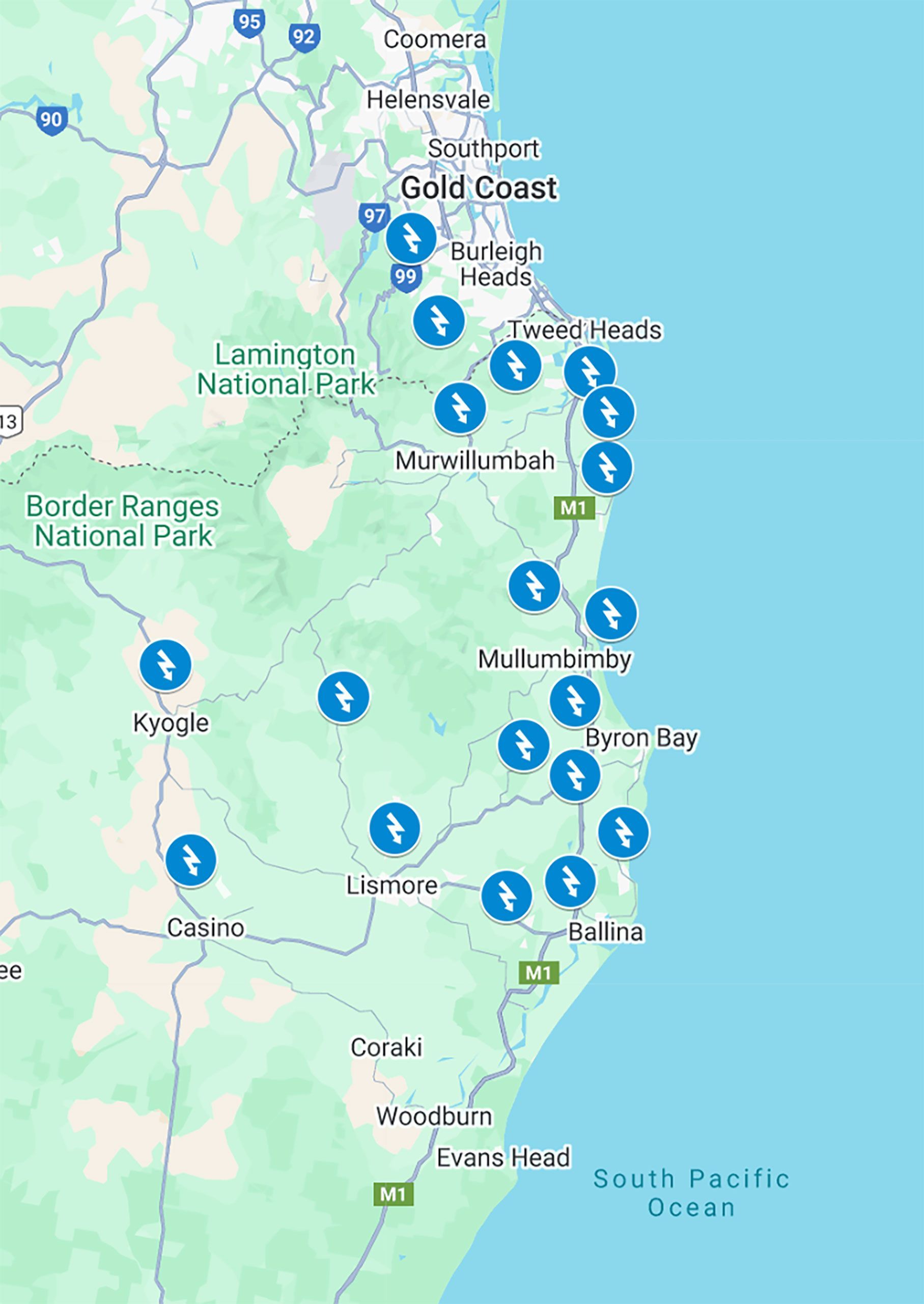 A Hand Holding a White Electrical Outlet With Visible Burn Damage — Intolec Electrical In Tweed Heads, NSW