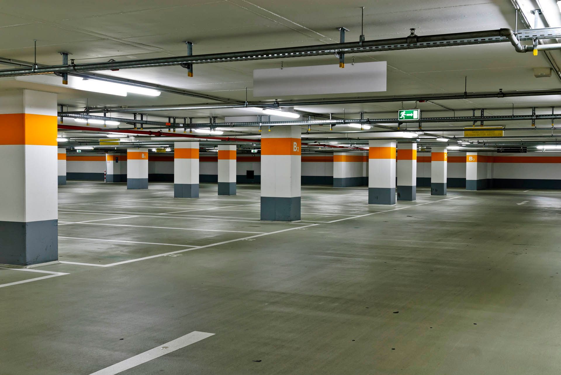 White Ceiling With Red Pipes and Bird Deterrent Spikes — Intolec Electrical In Tweed Heads, NSW