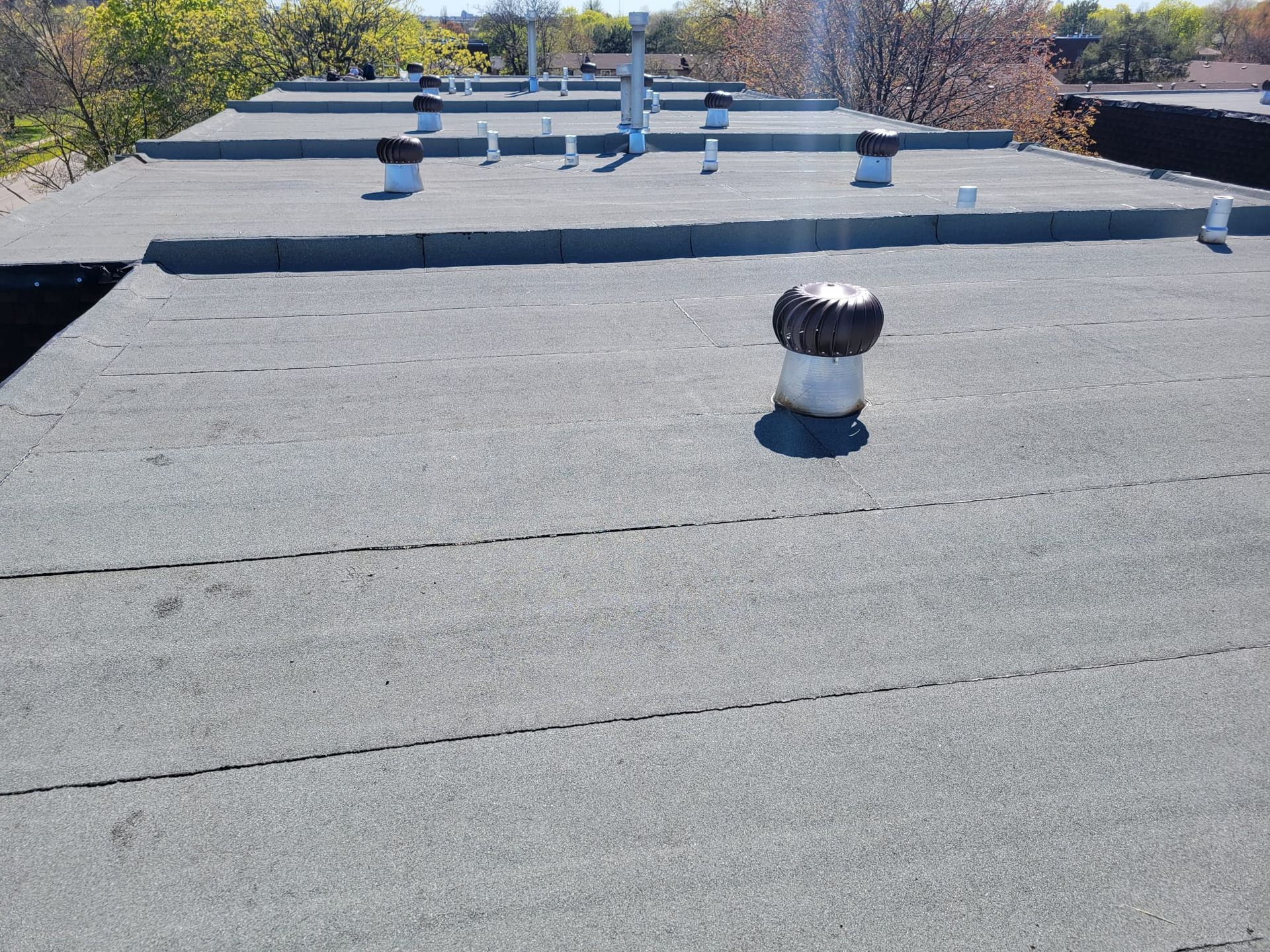 A roof with a lot of vents on it
