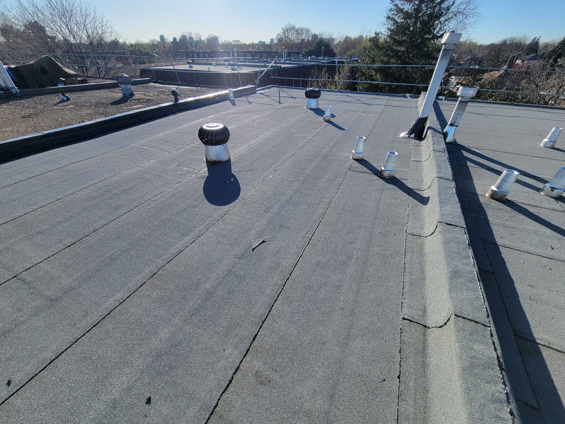 A roof with a lot of vents on it