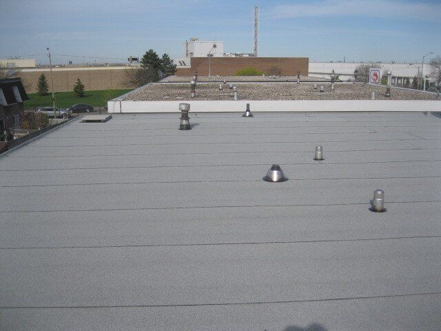 A roof with a lot of vents on it