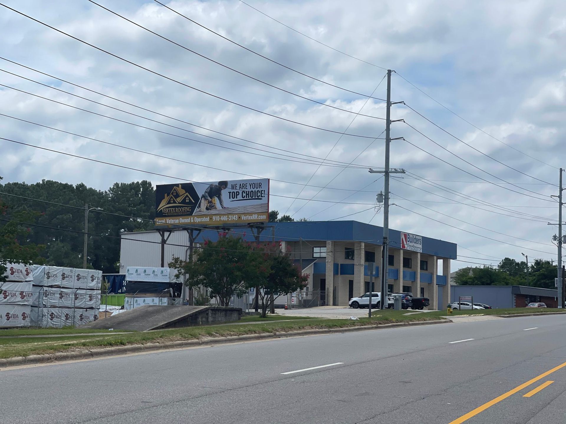 A large building with a billboard on the side of it