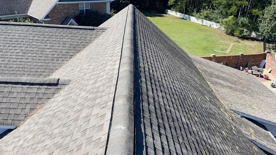 The roof of a house with a lot of shingles on it