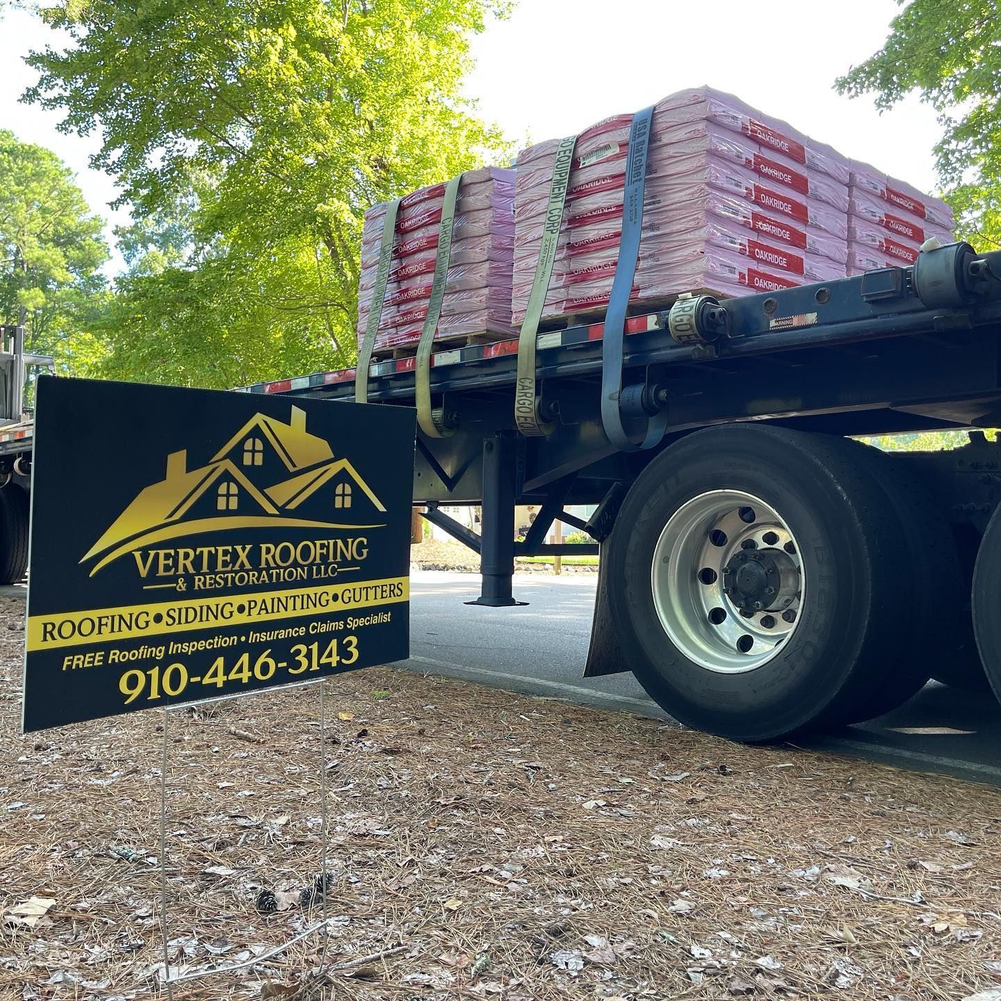 A truck with a sign on the side of it that says vertex roofing.