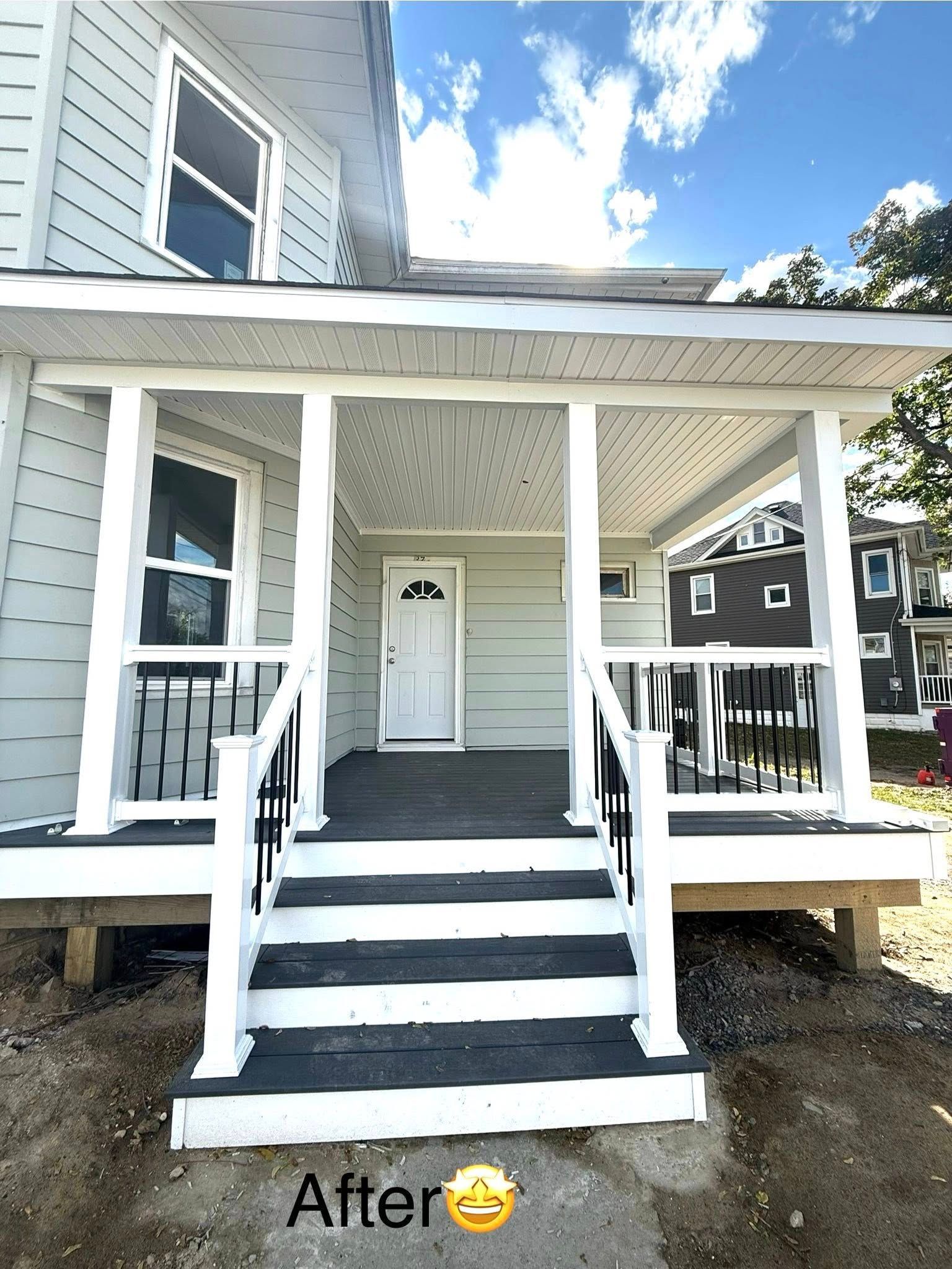 Newly renovated house with a front porch.