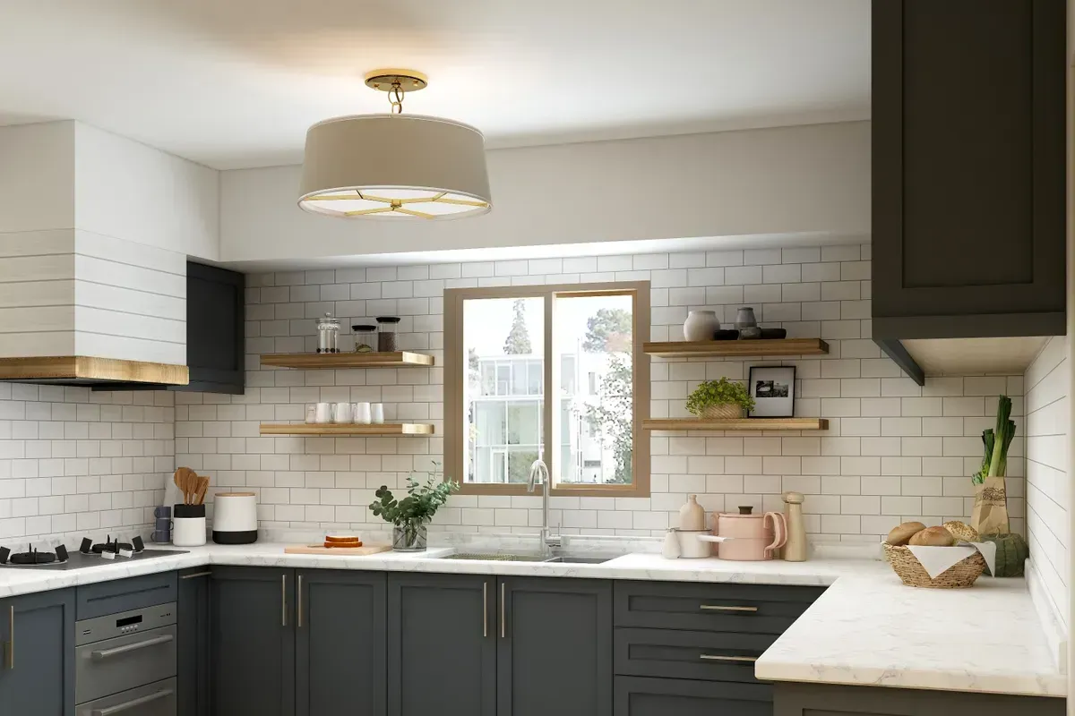 Modern kitchen with dark gray cabinets.