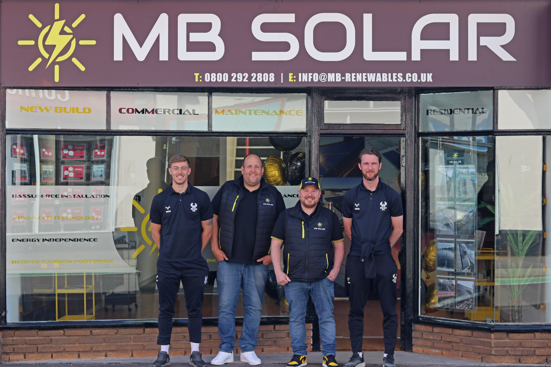 MB Solar with Kidderminster Harriers outside the new MB Solar showroom on Worcester Street, Kidderminster.
