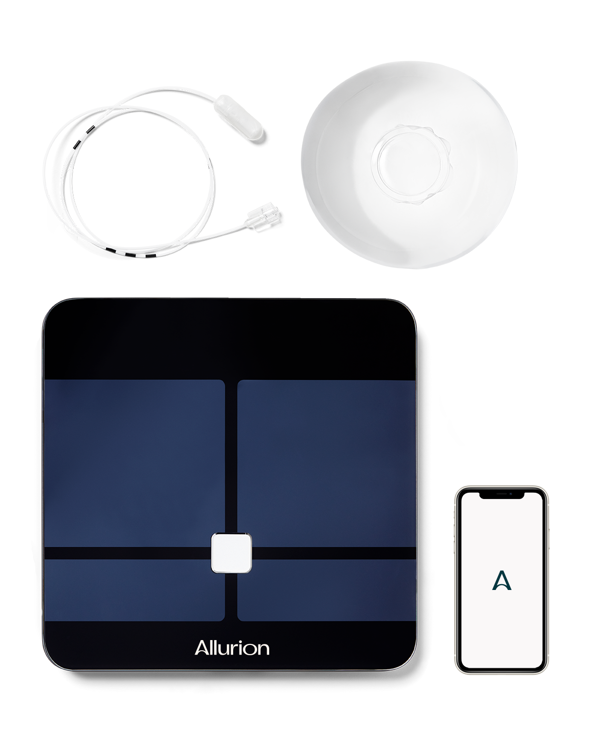 A smart scale is sitting next to a phone and a plate.