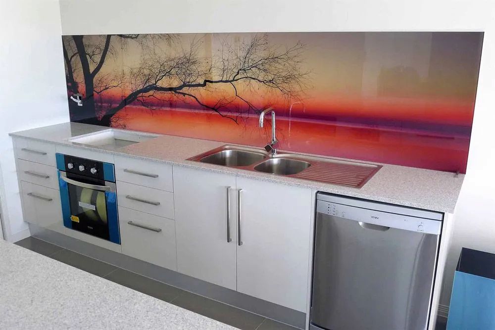 A Kitchen With Two Sinks, A Stove, And A Dishwasher — Hayes & Swinburn Glass in Westcourt, QLD