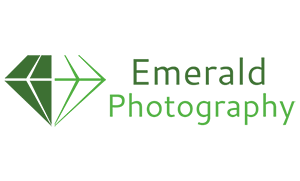 The logo for emerald photography has a green diamond on it.