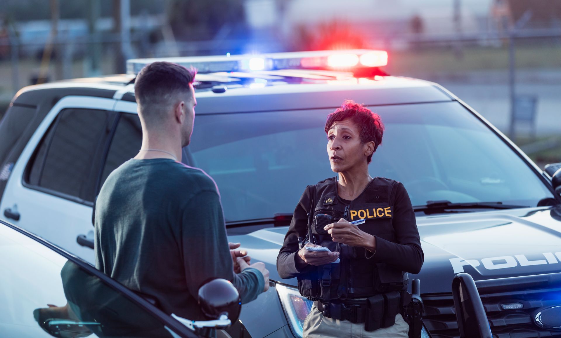 Police Officer Talking to a Civilian — Eau Claire, WI — Cohen Law Offices