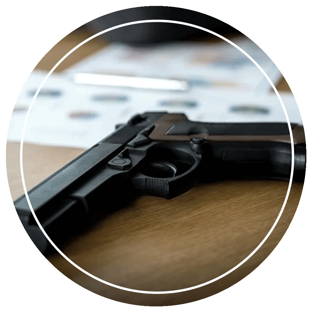 Handgun On Desk — Eau Claire, WI — Cohen Law Offices, LLC