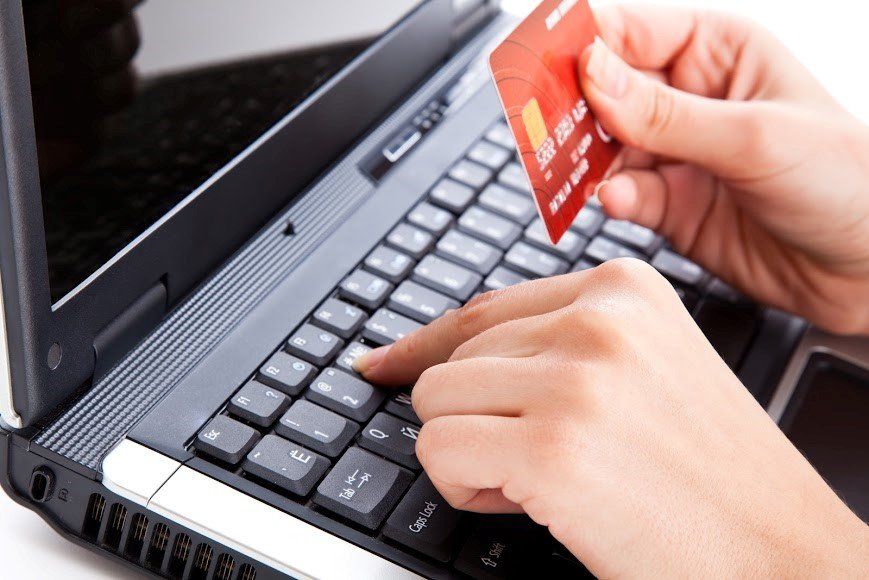 Laptop And Credit Card — Eau Claire, WI — Cohen Law Offices