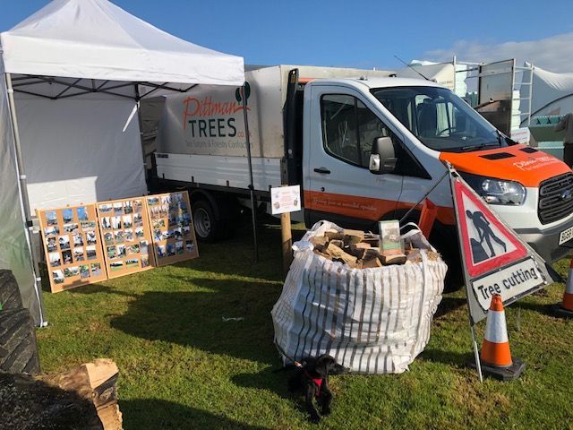 A white truck with the word trees on it