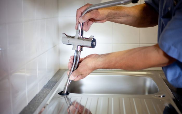 Fixing Faucet — Charlotte, FL — B & K Plumbing Inc