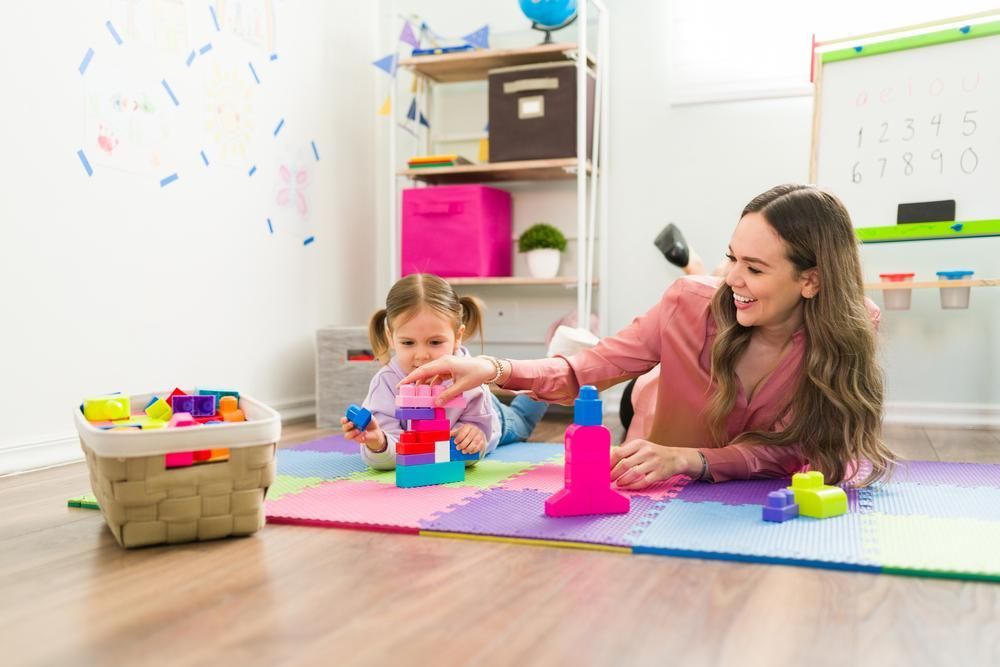A Woman and A Girl Are Playing with Blocks — Oracle Psychology Child & Adolescent Psychologists Newcastle in Newcastle, NSW