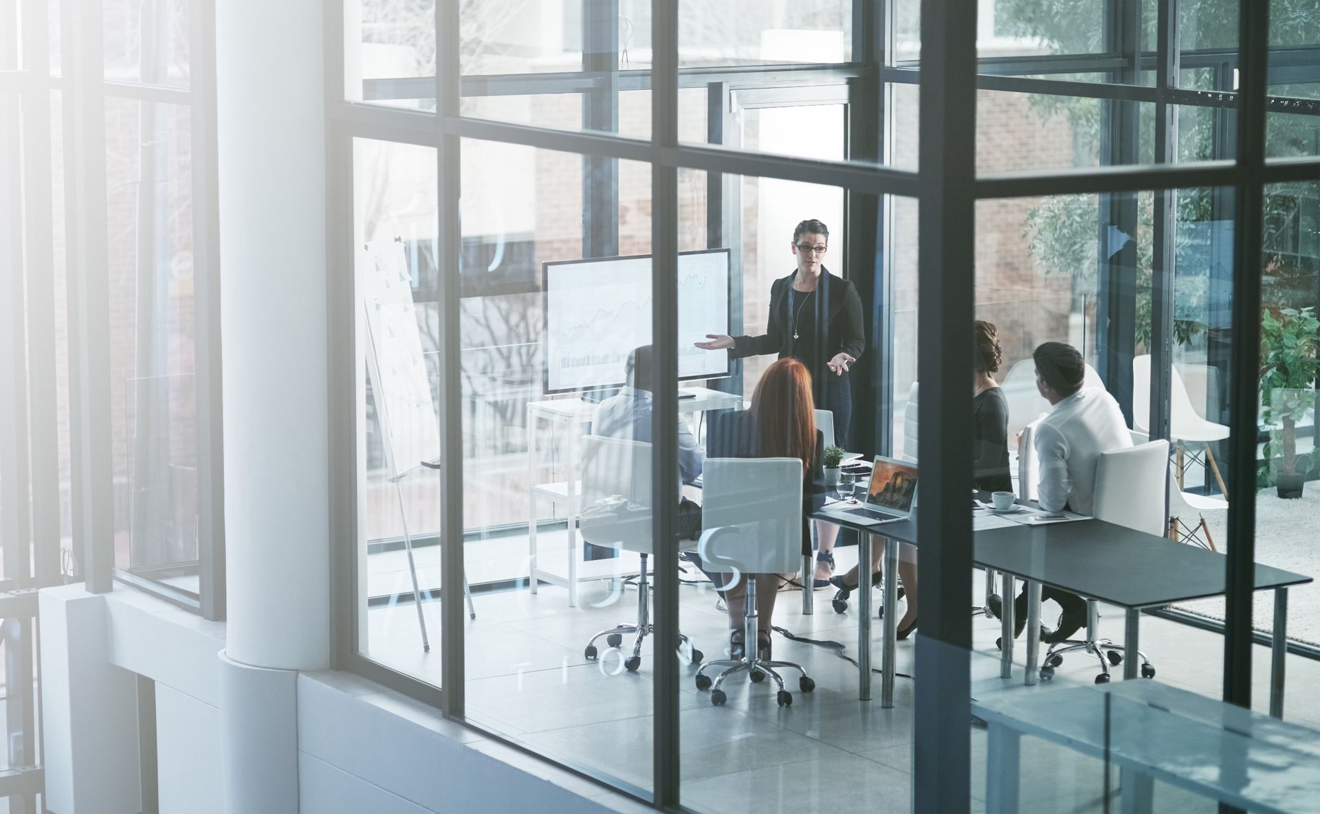 A group of people are having a meeting in an office.