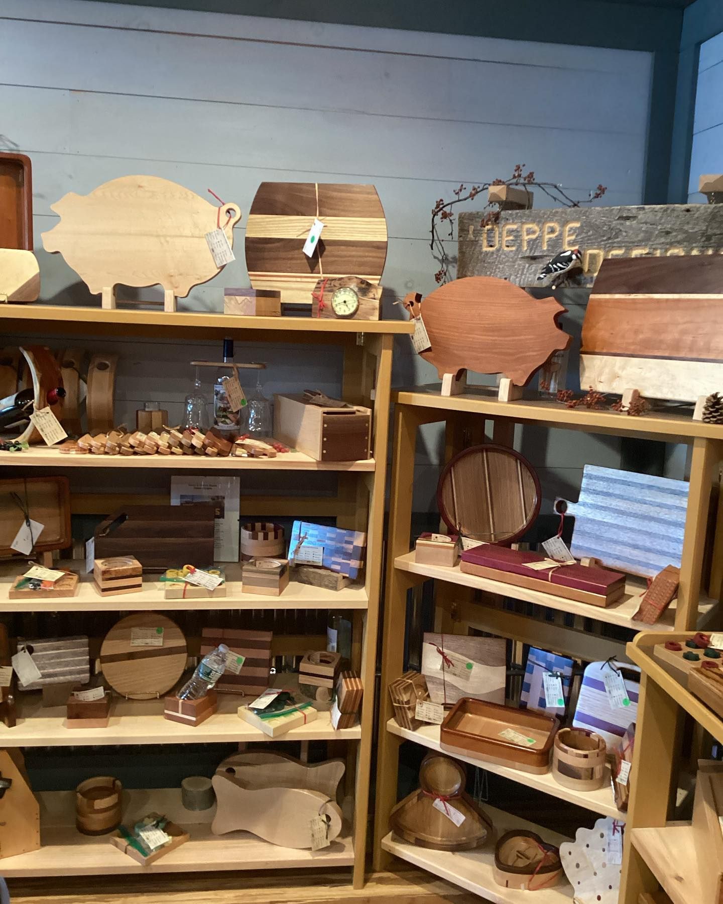 A store filled with lots of wooden items including cutting boards